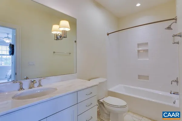 a kitchen with a stove and a sink