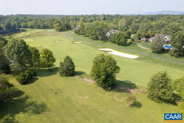 a view of a swimming pool with a mountain view