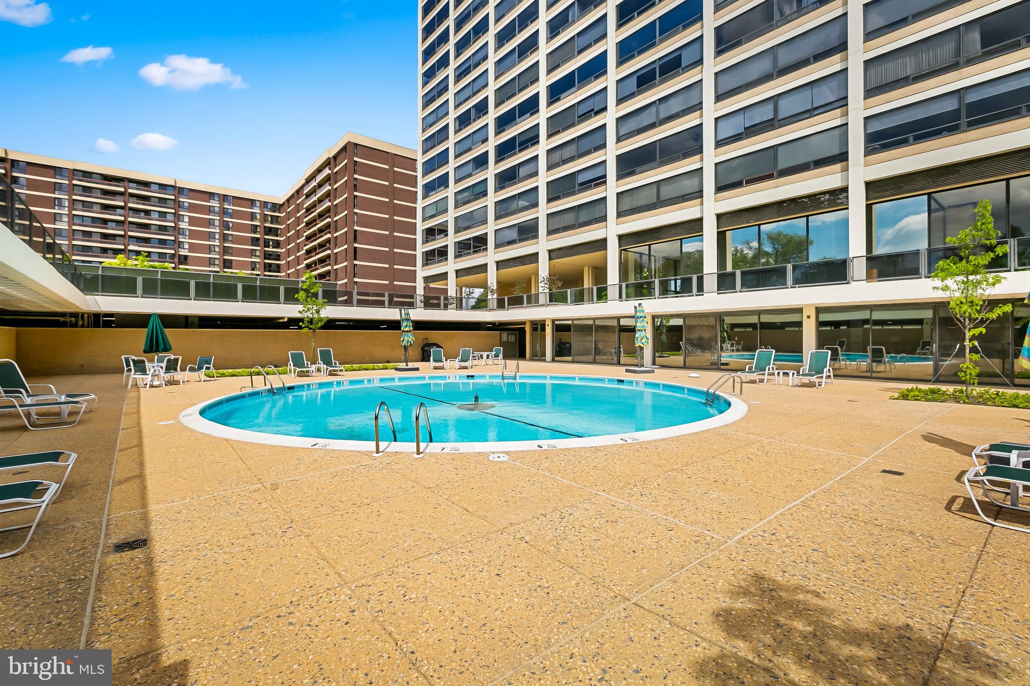 a view of a building with a swimming pool