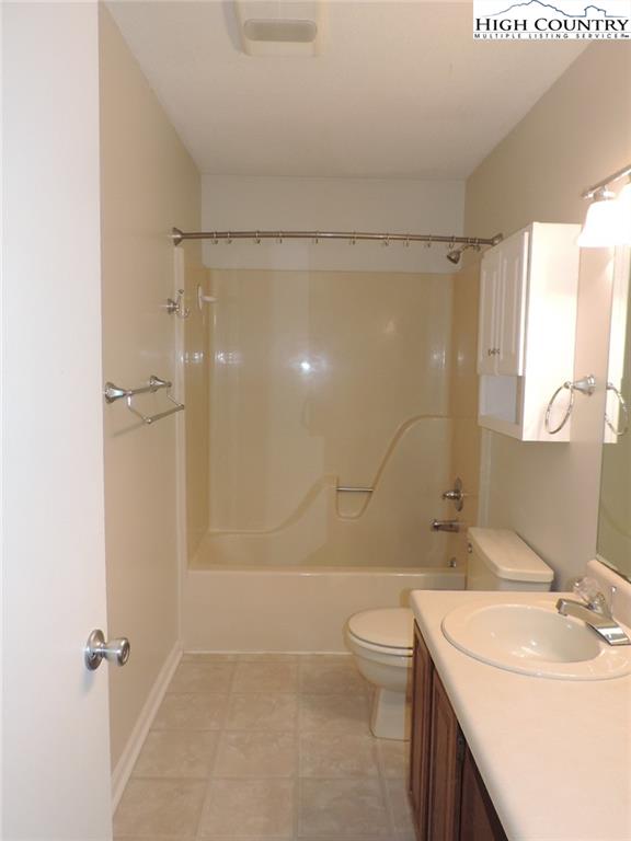 5416 Bamboo Road Boone, NC 28607 - Photo 18 of 24 a bathroom with a sink a toilet and shower