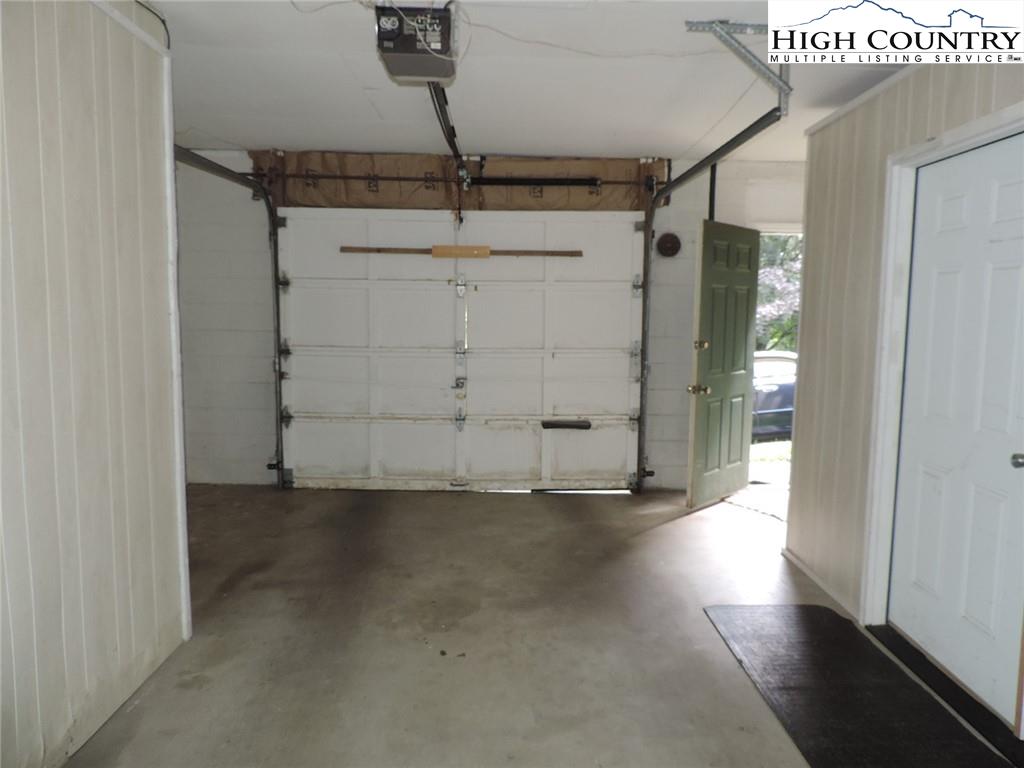 5416 Bamboo Road Boone, NC 28607 - Photo 22 of 24 an empty room with wooden floor