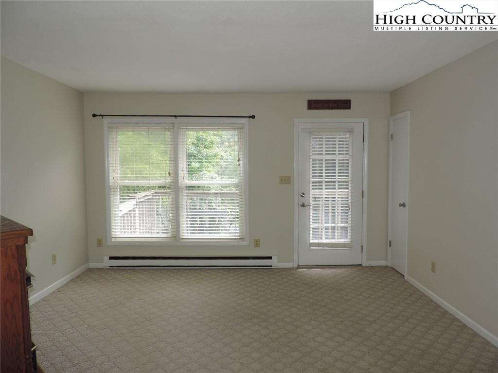 5416 Bamboo Road Boone, NC 28607 - Photo 5 of 24 an empty room with a window