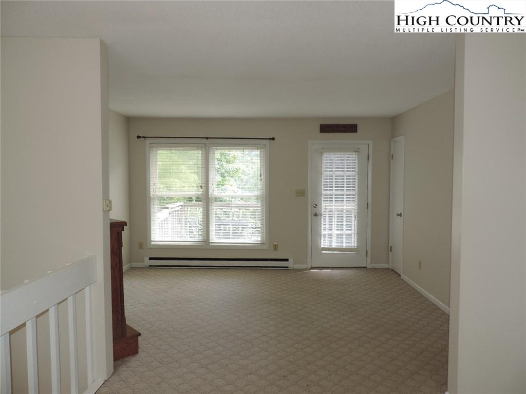 5416 Bamboo Road Boone, NC 28607 - Photo 8 of 24 a view of an empty room with a window