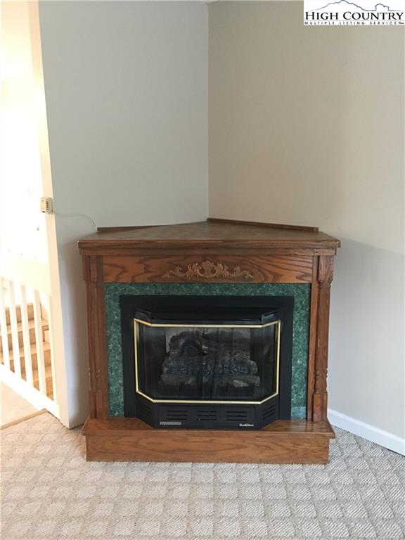 5416 Bamboo Road Boone, NC 28607 - Photo 10 of 24 a living room with a fireplace