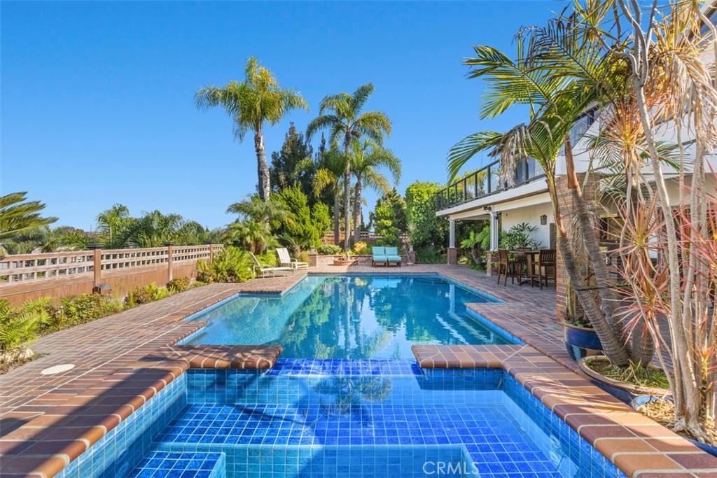 6421 East Bixby Hill Road Long Beach, CA 90815 - Photo 31 of 35 a view of outdoor space with swimming pool