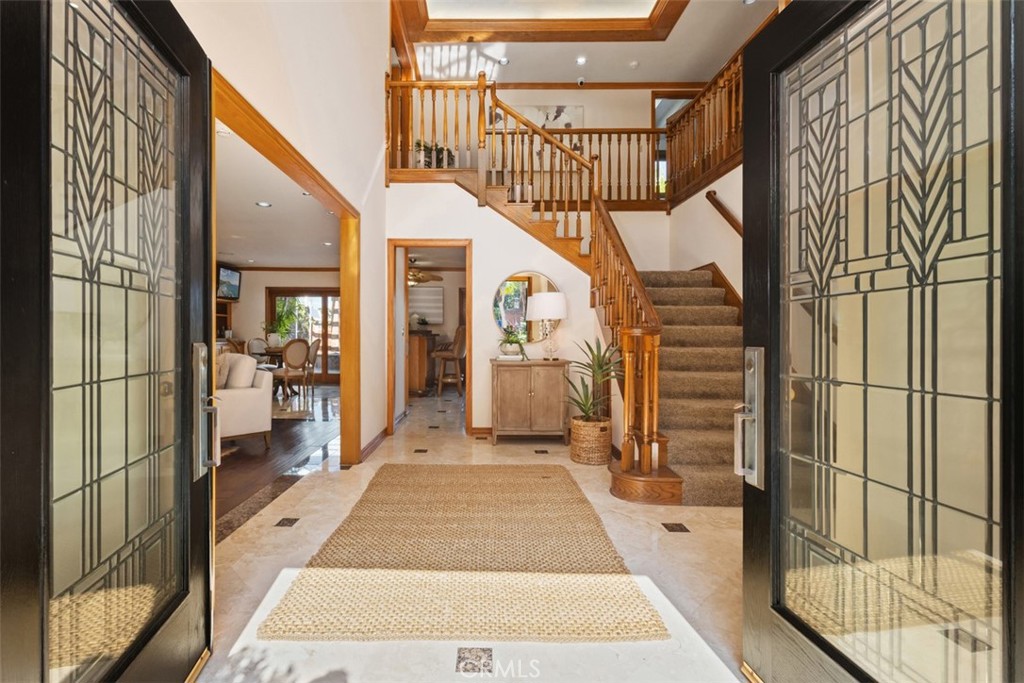 6421 East Bixby Hill Road Long Beach, CA 90815 - Photo 7 of 35 a hallway with a white stove next to a window