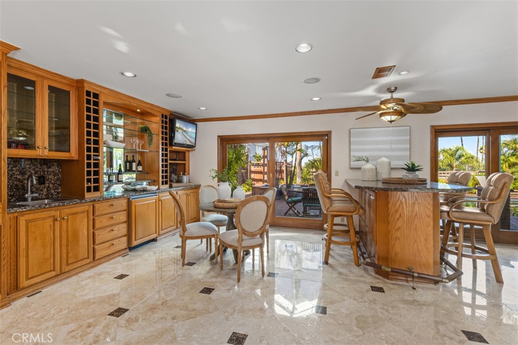 6421 East Bixby Hill Road Long Beach, CA 90815 - Photo 9 of 35 a very nice looking dining room with a large window