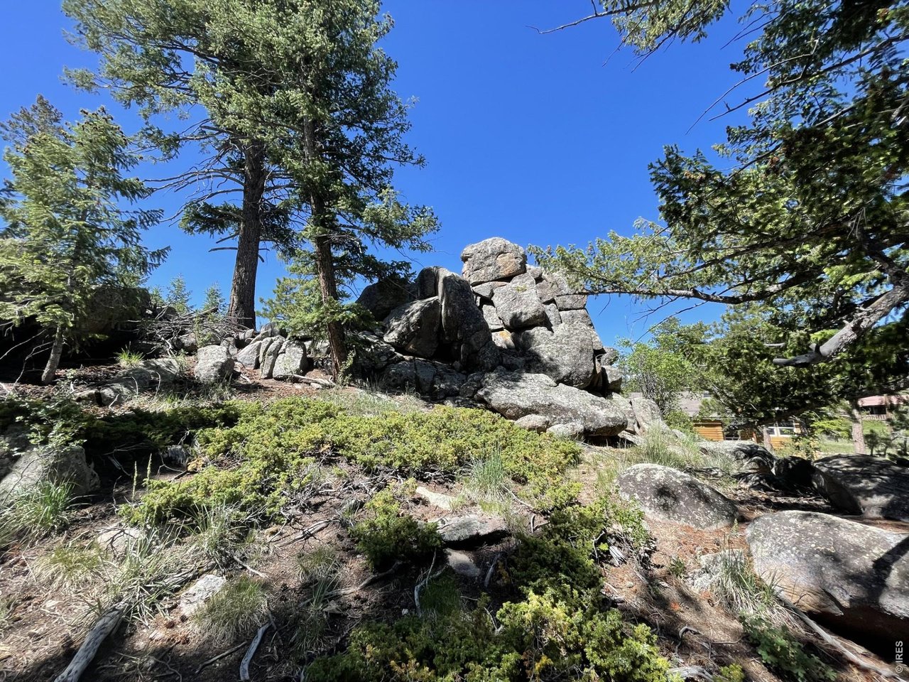 35 Robin Path Red Feather Lakes, CO 80545 - Photo 23 of 25 Rock outcroppings add interest & privacy to the property.