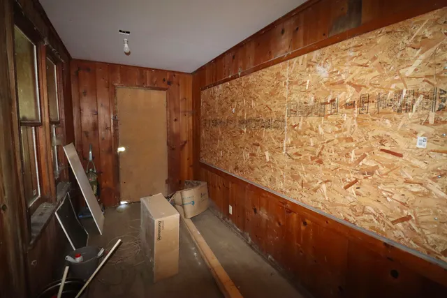 a view of balcony with wooden floor