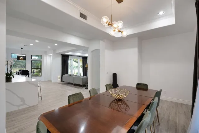 a bedroom with a bed and a lamp