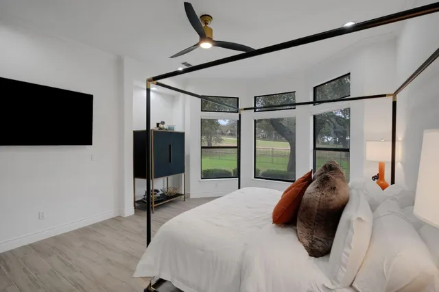 a bathroom with a bathtub and a sink