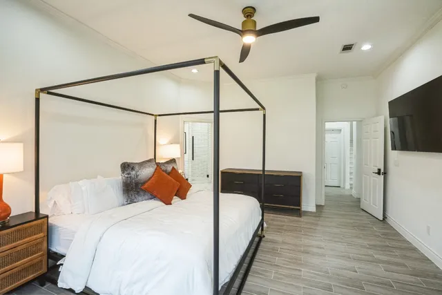 a white bath tub sitting next to a window