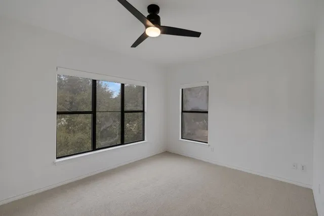 a swimming pool with outdoor seating and yard