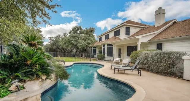 a view of a golf course with a lake