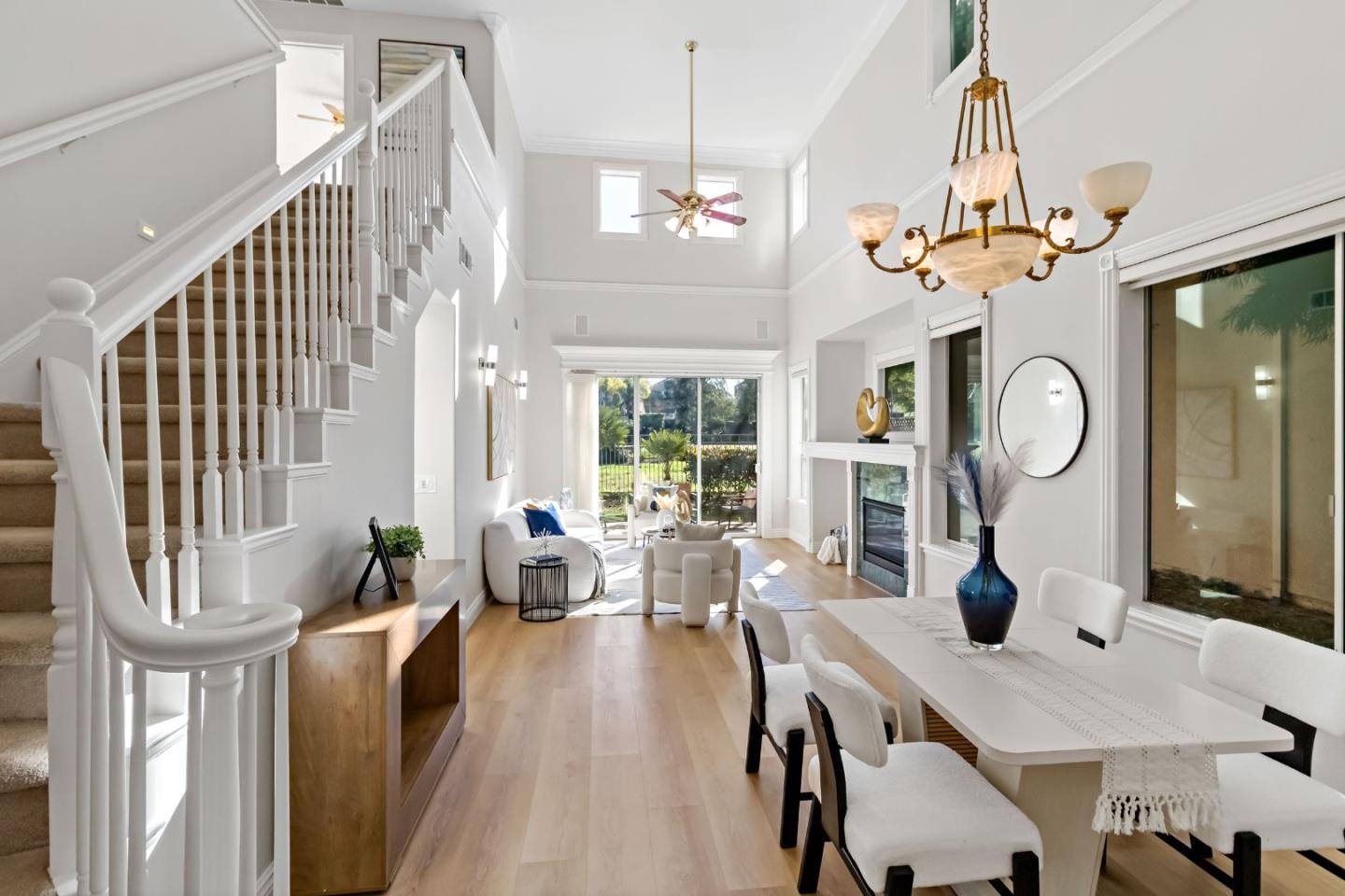 5335 Roxburghe Court San Jose, CA 95138 - Photo 13 of 60 a view of a dining room with furniture window and wooden floor
