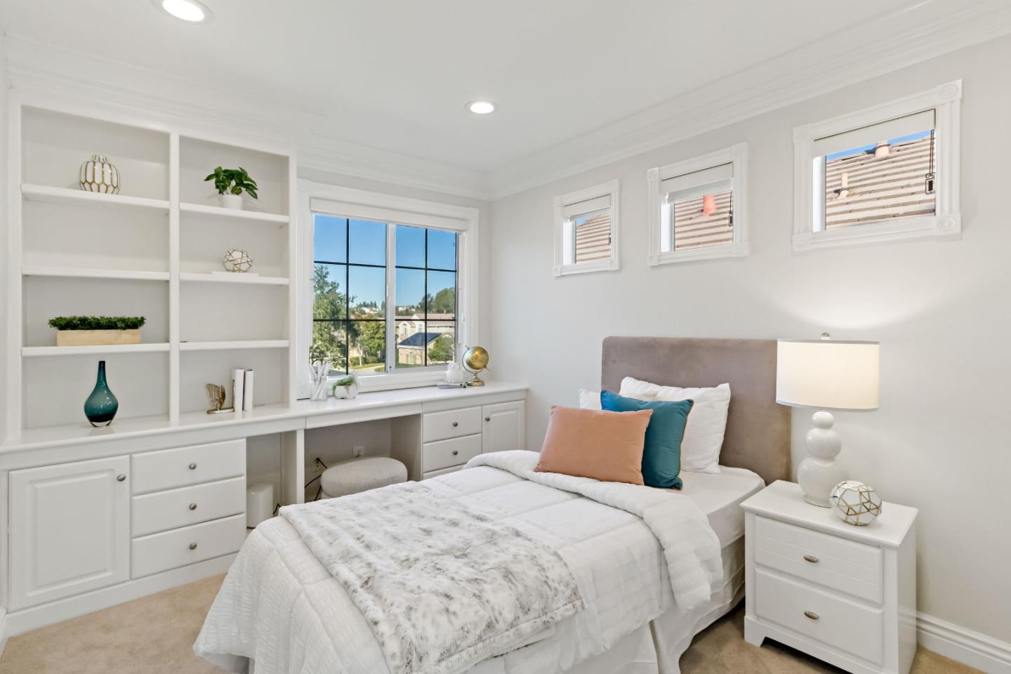 5335 Roxburghe Court San Jose, CA 95138 - Photo 41 of 60 a bedroom with a bed and a window
