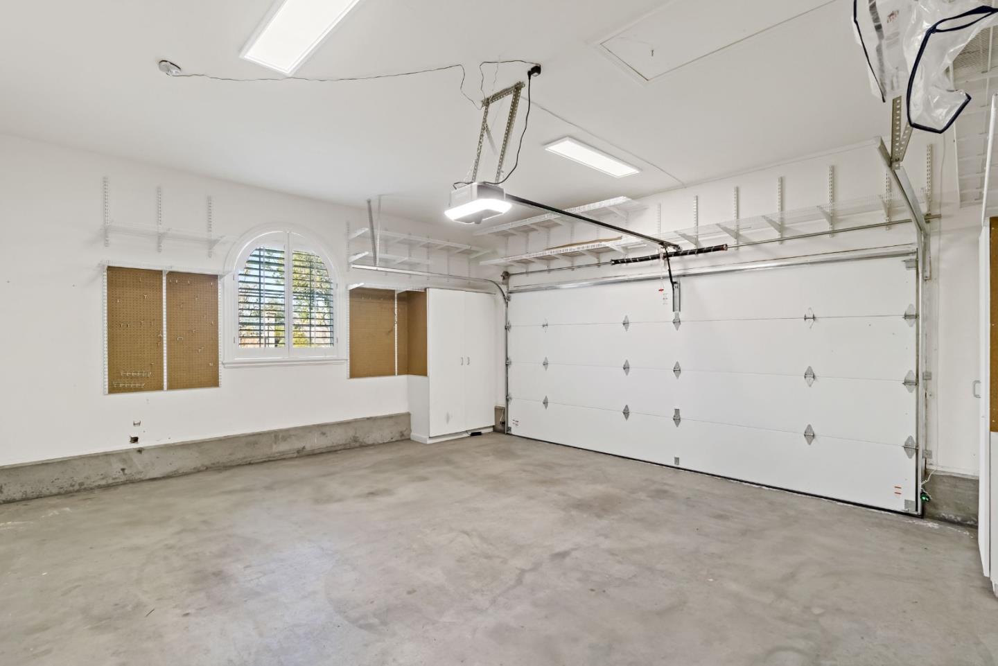 5335 Roxburghe Court San Jose, CA 95138 - Photo 47 of 60 an empty room with ceiling fan and windows