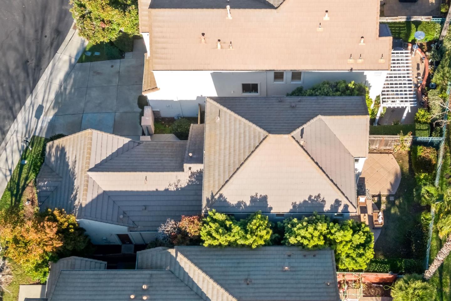 5335 Roxburghe Court San Jose, CA 95138 - Photo 58 of 60 a view of a patio with table and chairs and potted plants