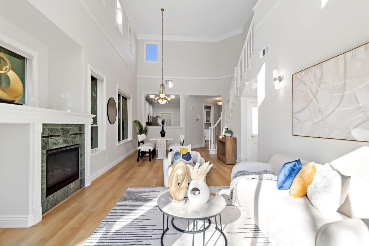 5335 Roxburghe Court San Jose, CA 95138 - Photo 9 of 60 a living room with fireplace furniture and a wooden floor