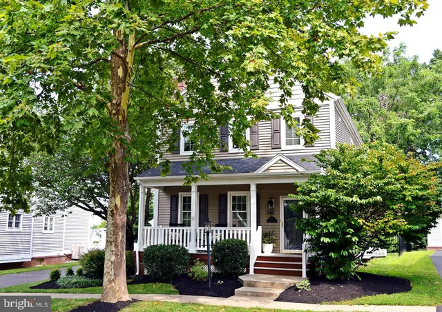 a kitchen with granite countertop wooden cabinets and a granite counter tops