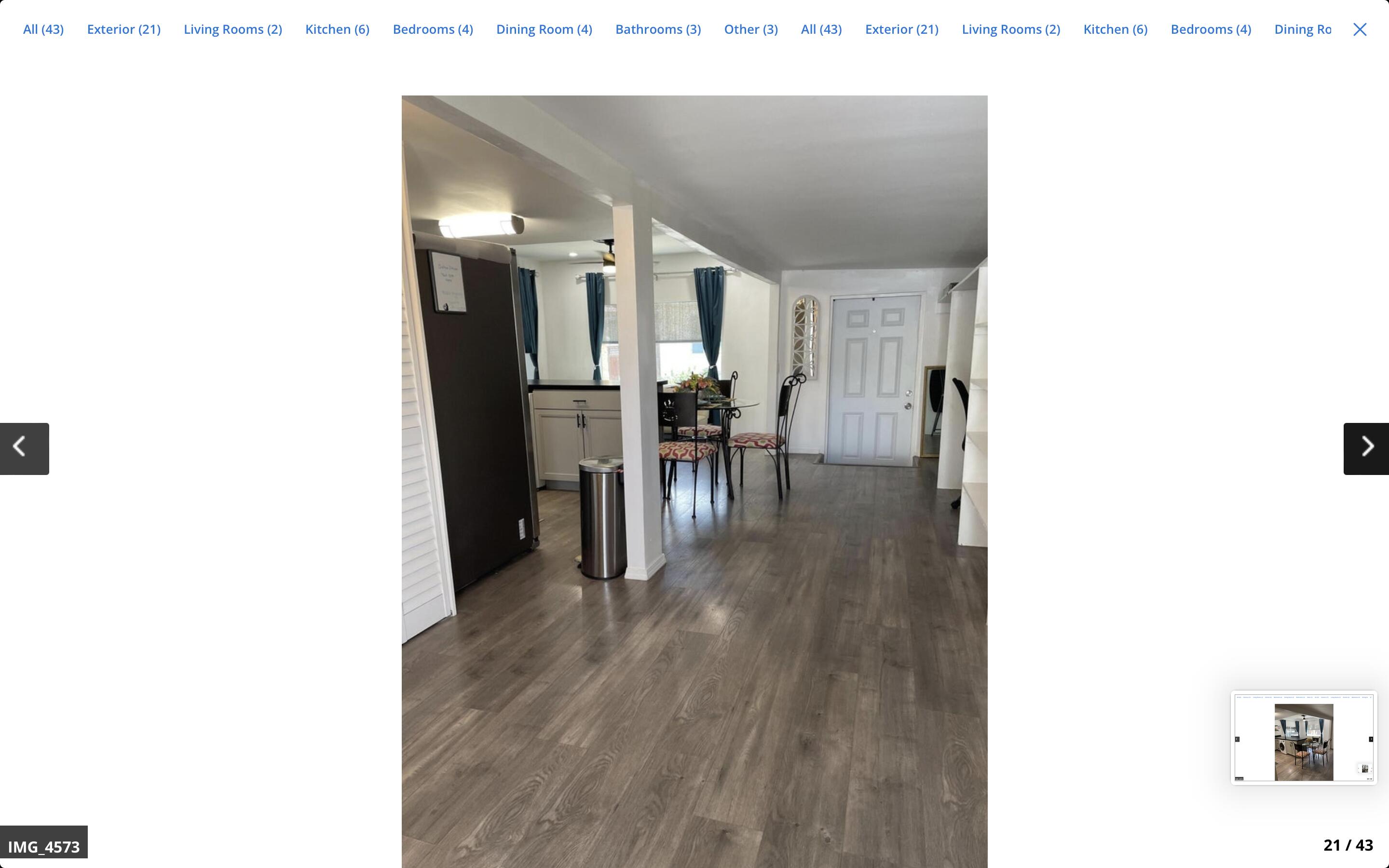 70260 Highway 111, Unit 57 Rancho Mirage, CA 92270 - Photo 20 of 38 a dining room with furniture and wooden floor