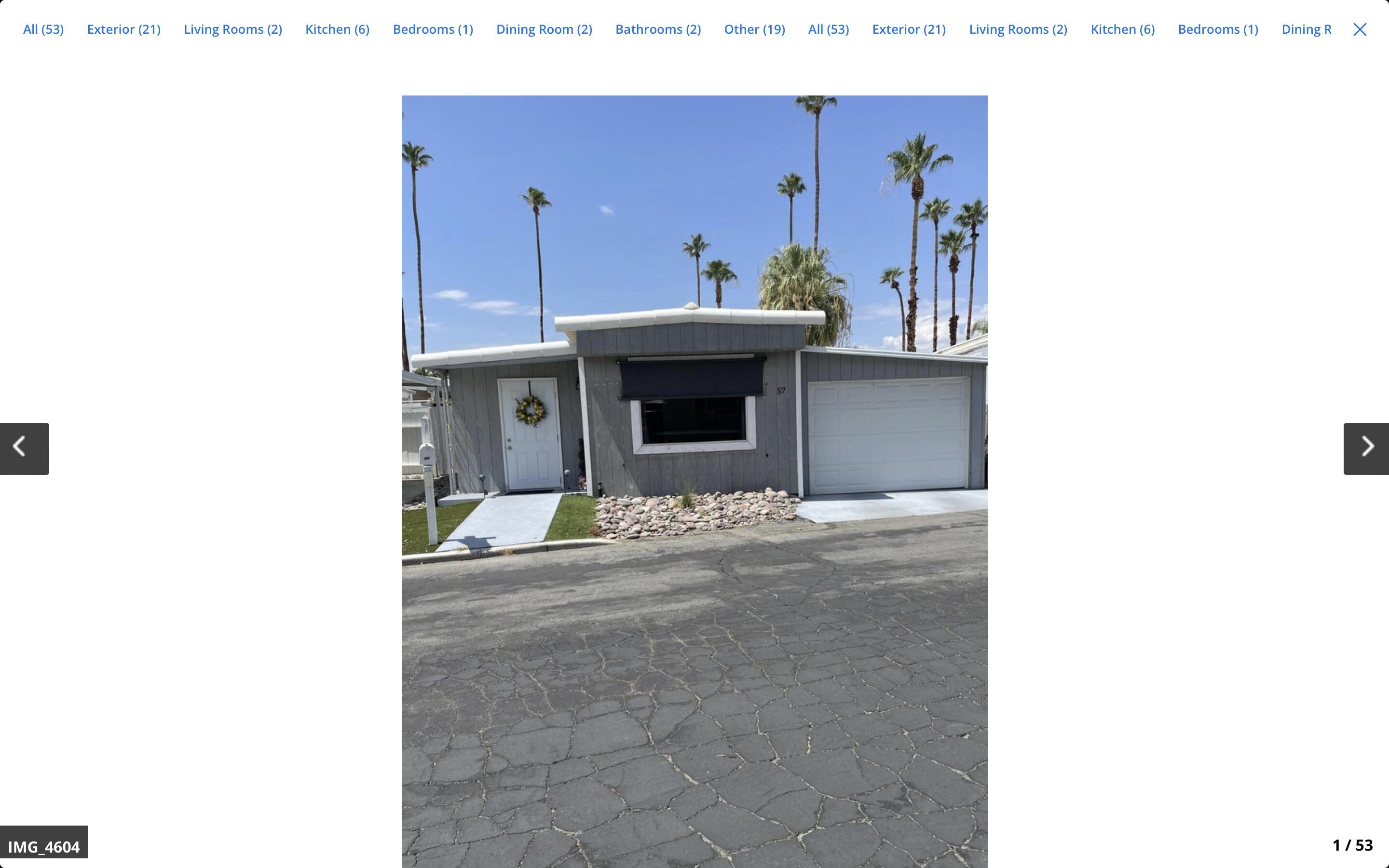 70260 Highway 111, Unit 57 Rancho Mirage, CA 92270 - Photo 3 of 38 a front view of a building with chandelier