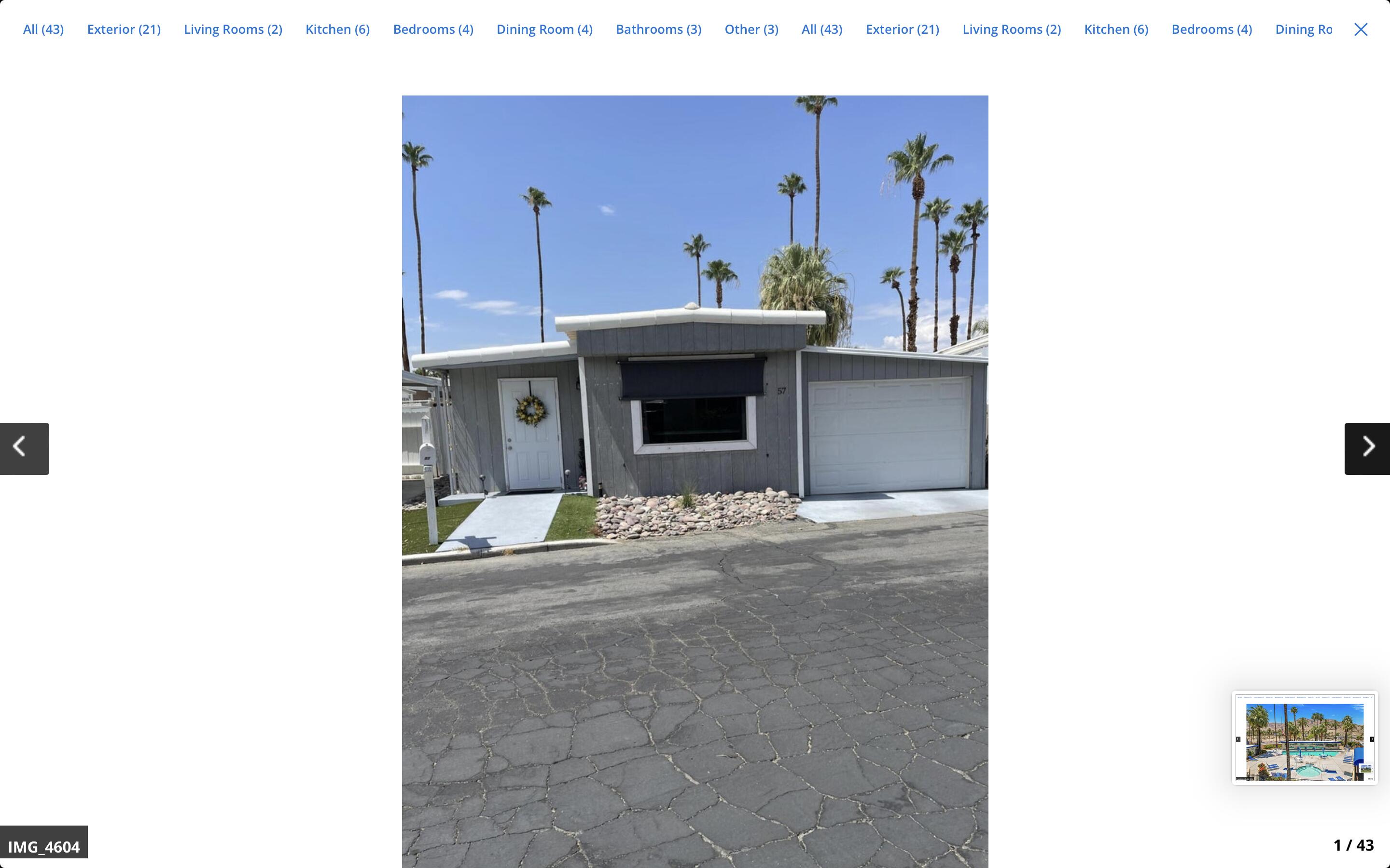70260 Highway 111, Unit 57 Rancho Mirage, CA 92270 - Photo 38 of 38 a front view of a building with chandelier