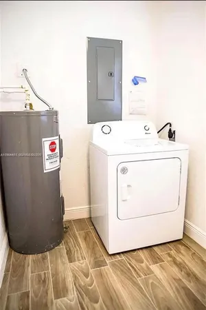 a utility room with a washer and dryer