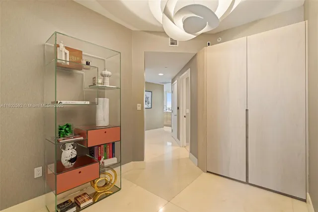 a view of a hallway with elevator