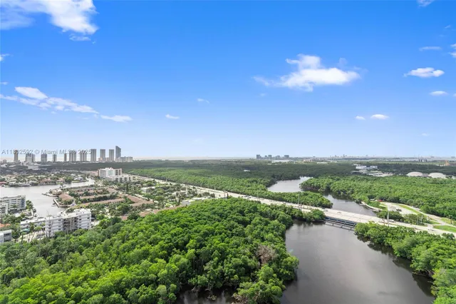 a view of a lake with a city