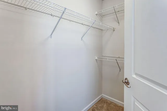 a view of a room with racks on the wall