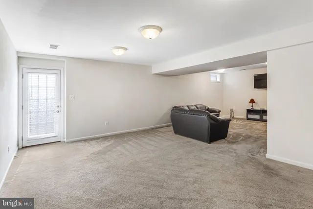 a view of livingroom with a couch