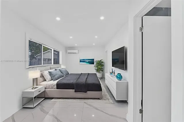 a room with table and chairs