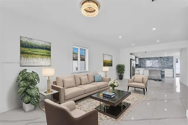a living room with furniture a rug a window and a table