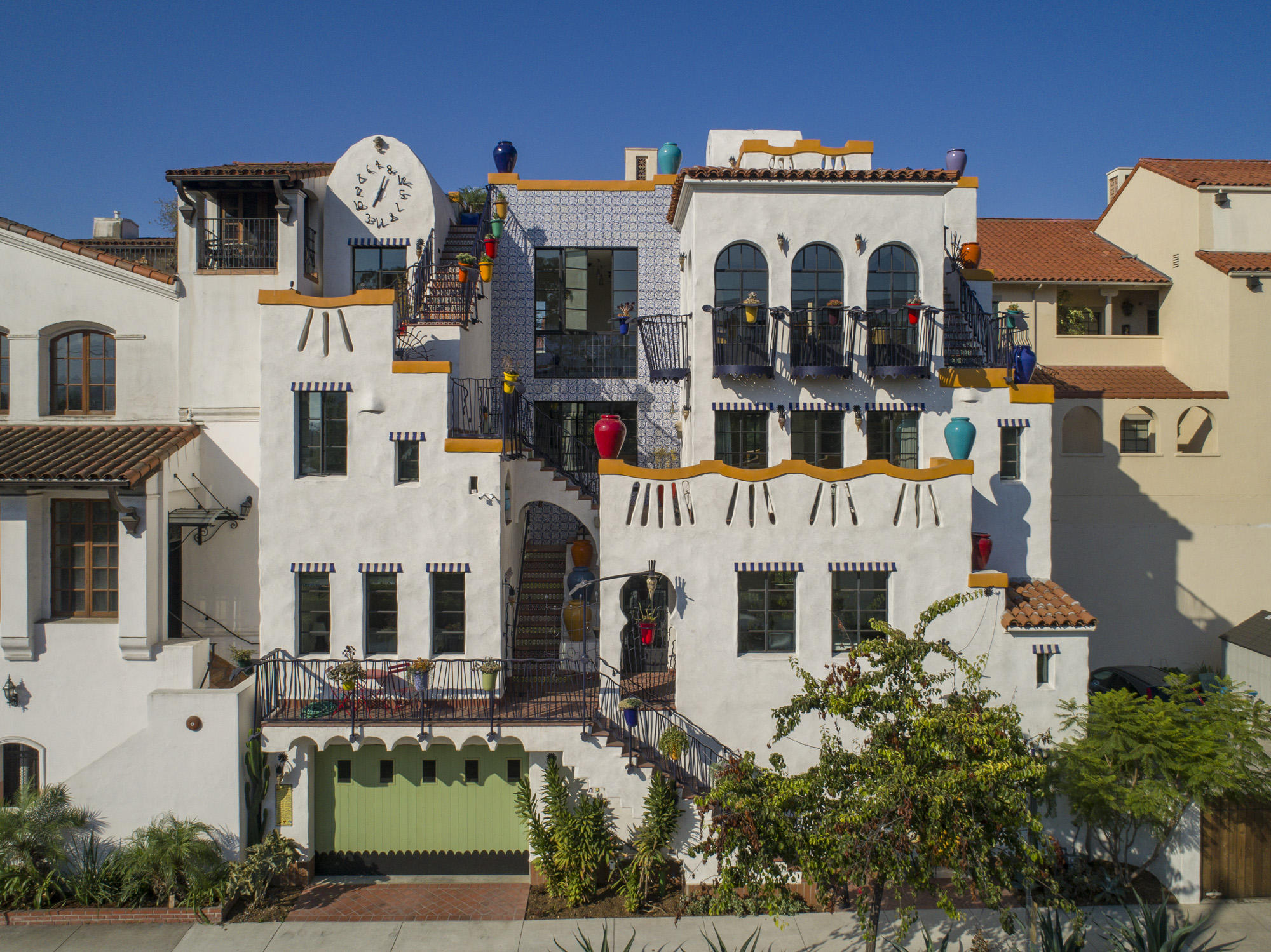 819 Garden Street Santa Barbara, CA 93101 - Photo 1 of 41 a view of multiple house with large windows and a yard