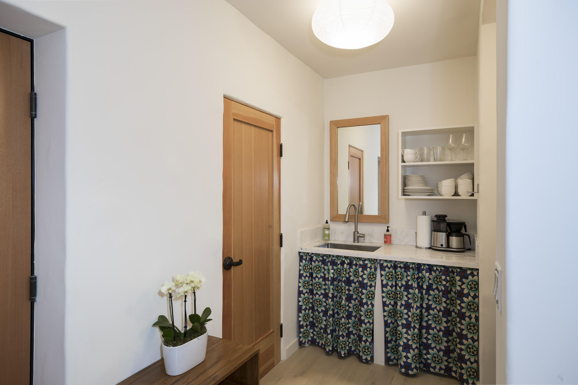 819 Garden Street Santa Barbara, CA 93101 - Photo 16 of 41 a bathroom with a sink and a mirror