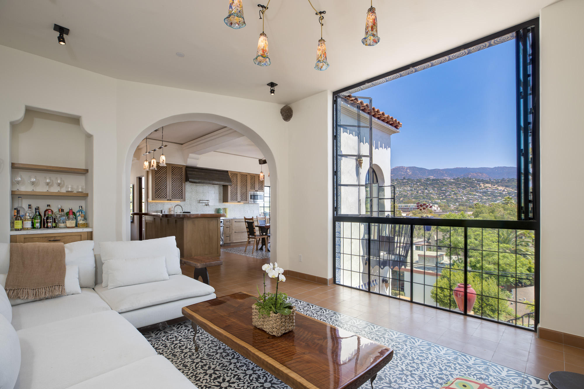 819 Garden Street Santa Barbara, CA 93101 - Photo 2 of 41 a living room with furniture and a large window