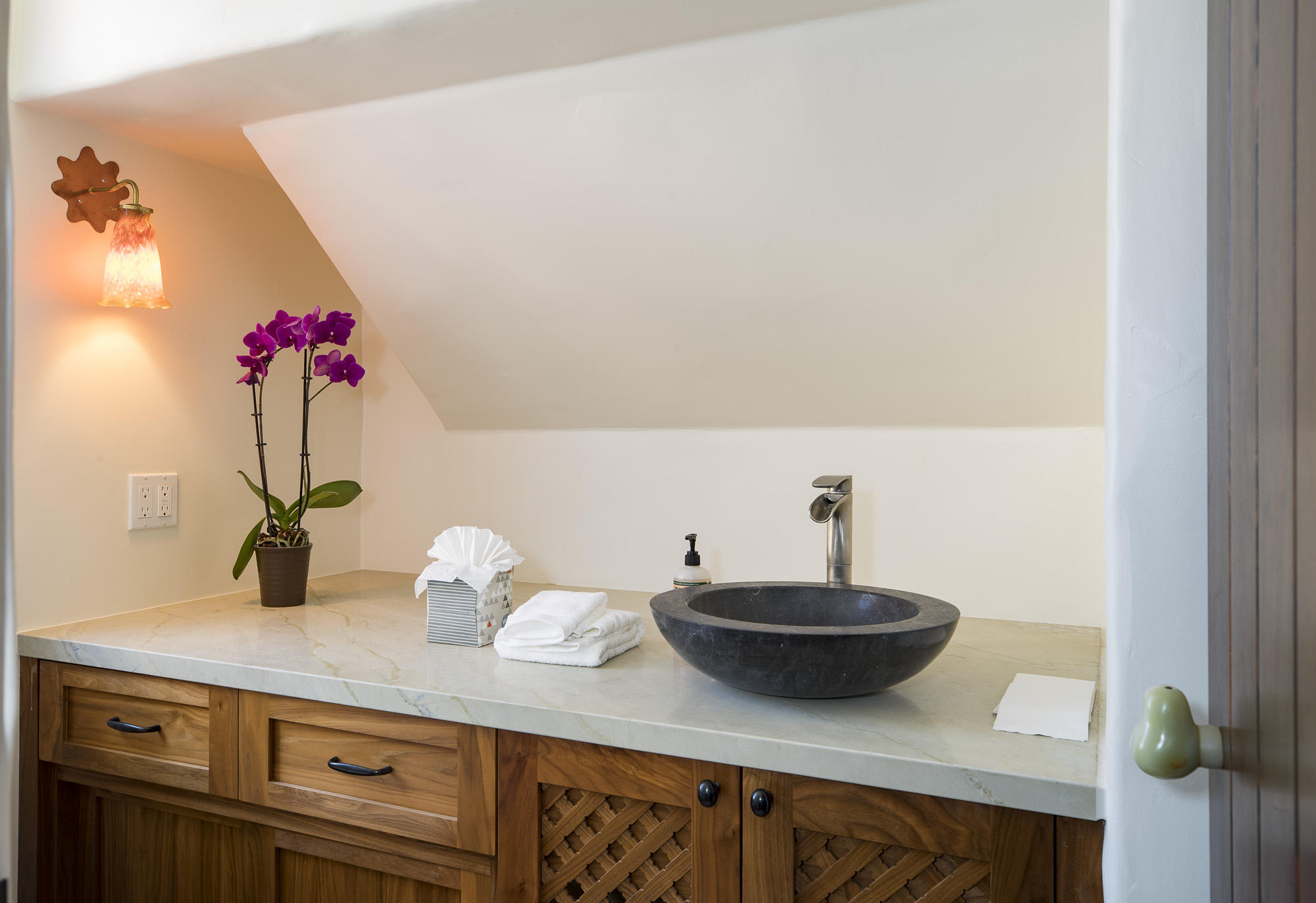 819 Garden Street Santa Barbara, CA 93101 - Photo 25 of 41 a sink and a mirror