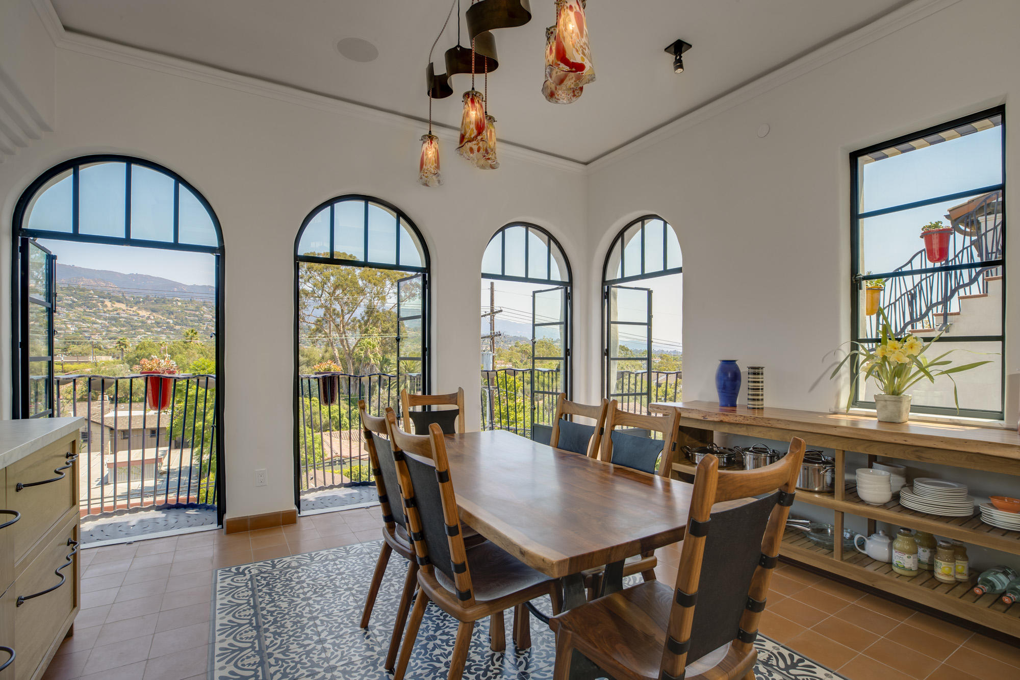 819 Garden Street Santa Barbara, CA 93101 - Photo 3 of 41 a view of a dining room with furniture window and wooden floor