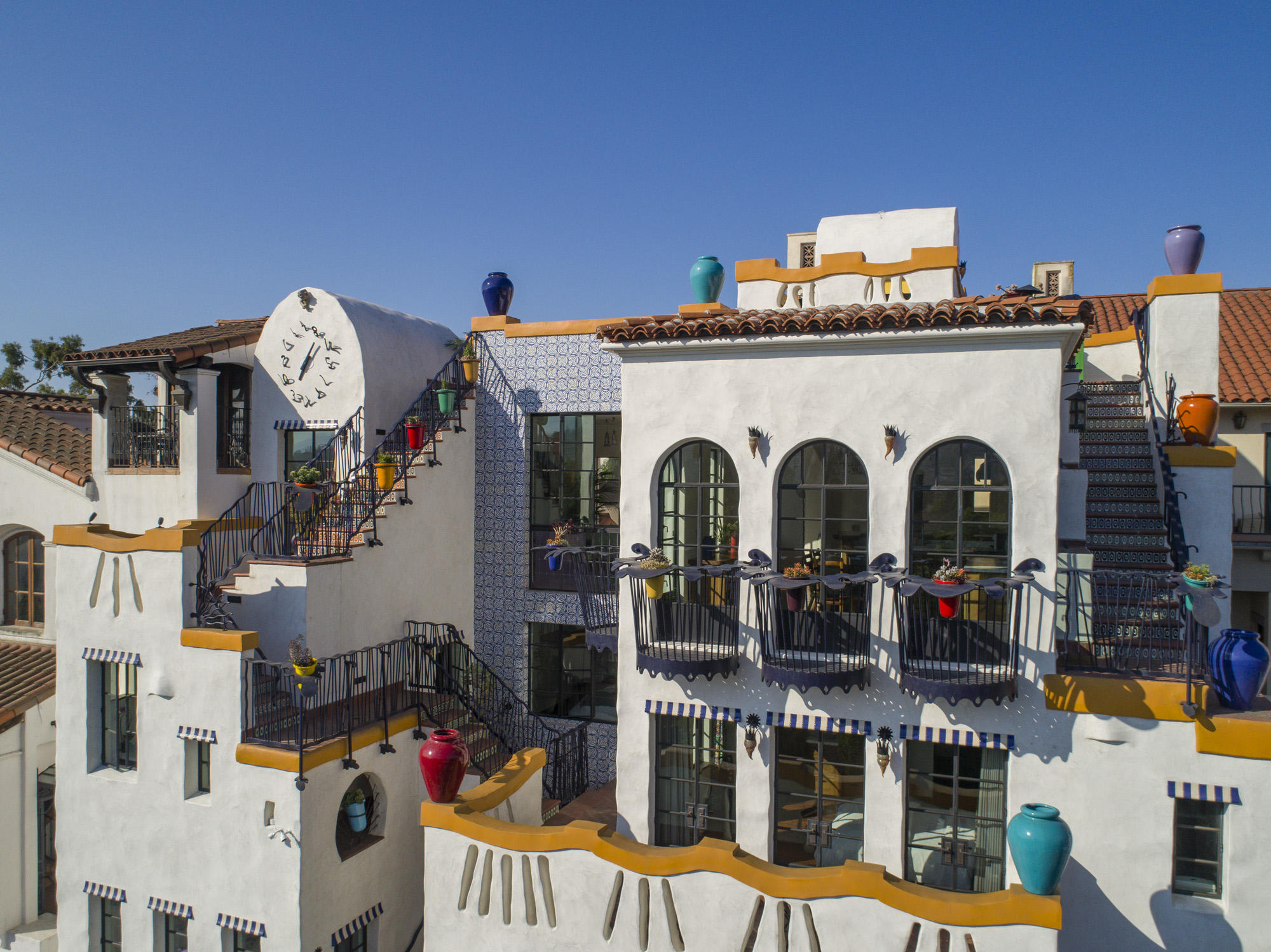 819 Garden Street Santa Barbara, CA 93101 - Photo 34 of 41 a front view of a house with large trees