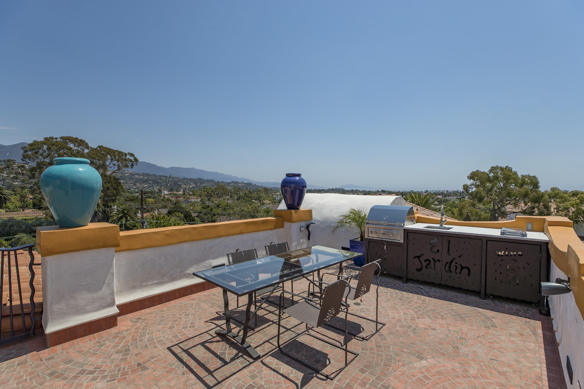 819 Garden Street Santa Barbara, CA 93101 - Photo 38 of 41 a living room with furniture and a wooden floor