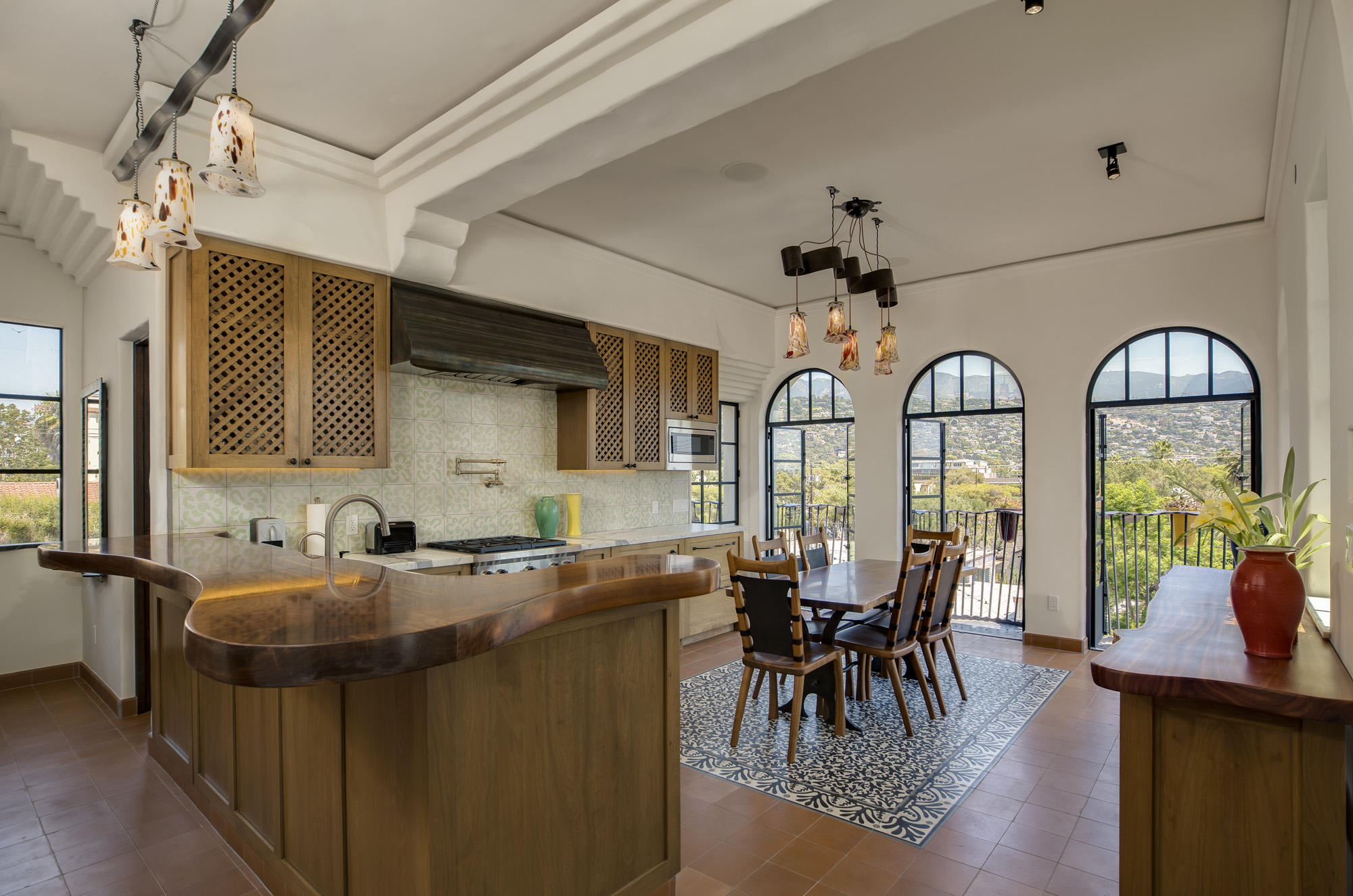 819 Garden Street Santa Barbara, CA 93101 - Photo 4 of 41 a view of a dining room with furniture window and wooden floor