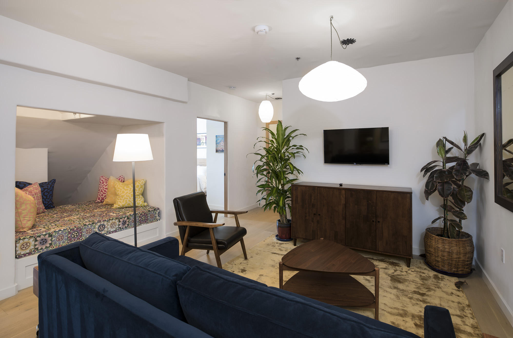 819 Garden Street Santa Barbara, CA 93101 - Photo 6 of 41 a living room with furniture and a flat screen tv