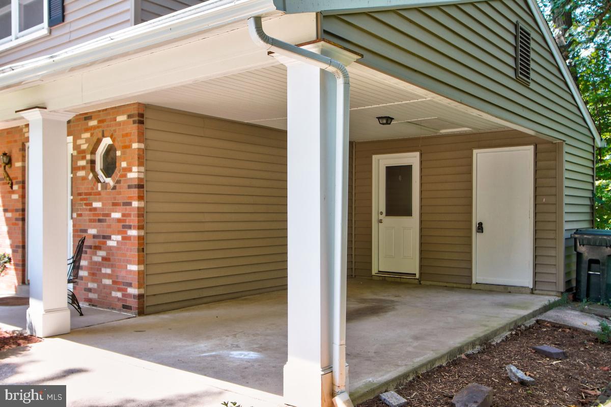 7102 Hadlow Court Springfield, VA 22152 - Photo 19 of 38 Park your car under the carport.