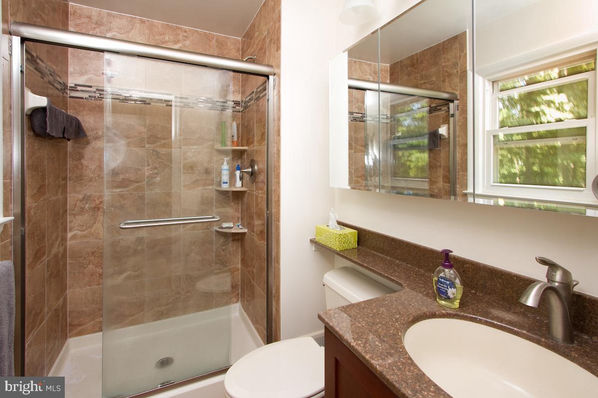 7102 Hadlow Court Springfield, VA 22152 - Photo 27 of 38 Master Bath with custom shower.