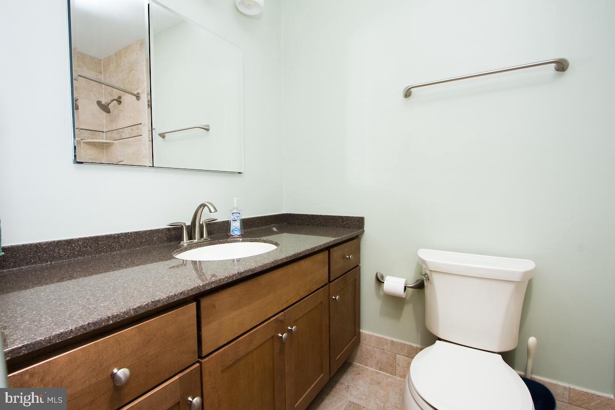 7102 Hadlow Court Springfield, VA 22152 - Photo 32 of 38 Upstairs hall bath.