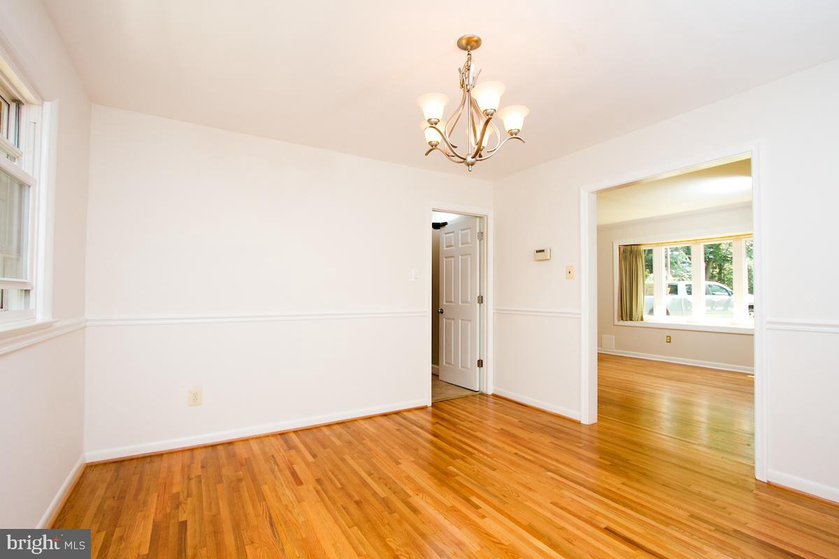 7102 Hadlow Court Springfield, VA 22152 - Photo 7 of 38 Dining room with Chair-rail molding.