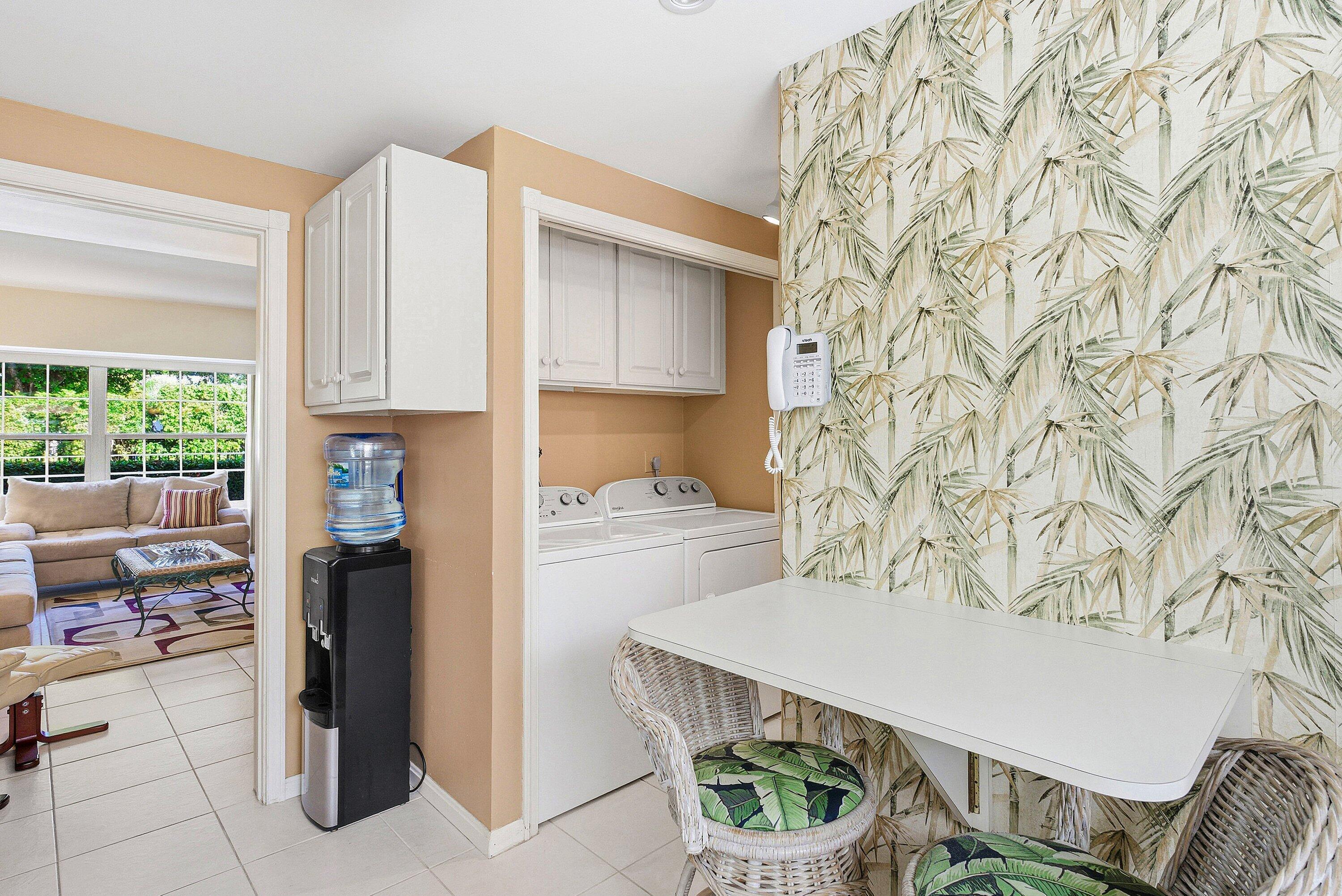 6590 North Ocean Boulevard, Unit 5 Ocean Ridge, FL 33435 - Photo 12 of 20 a kitchen with a refrigerator and a stove