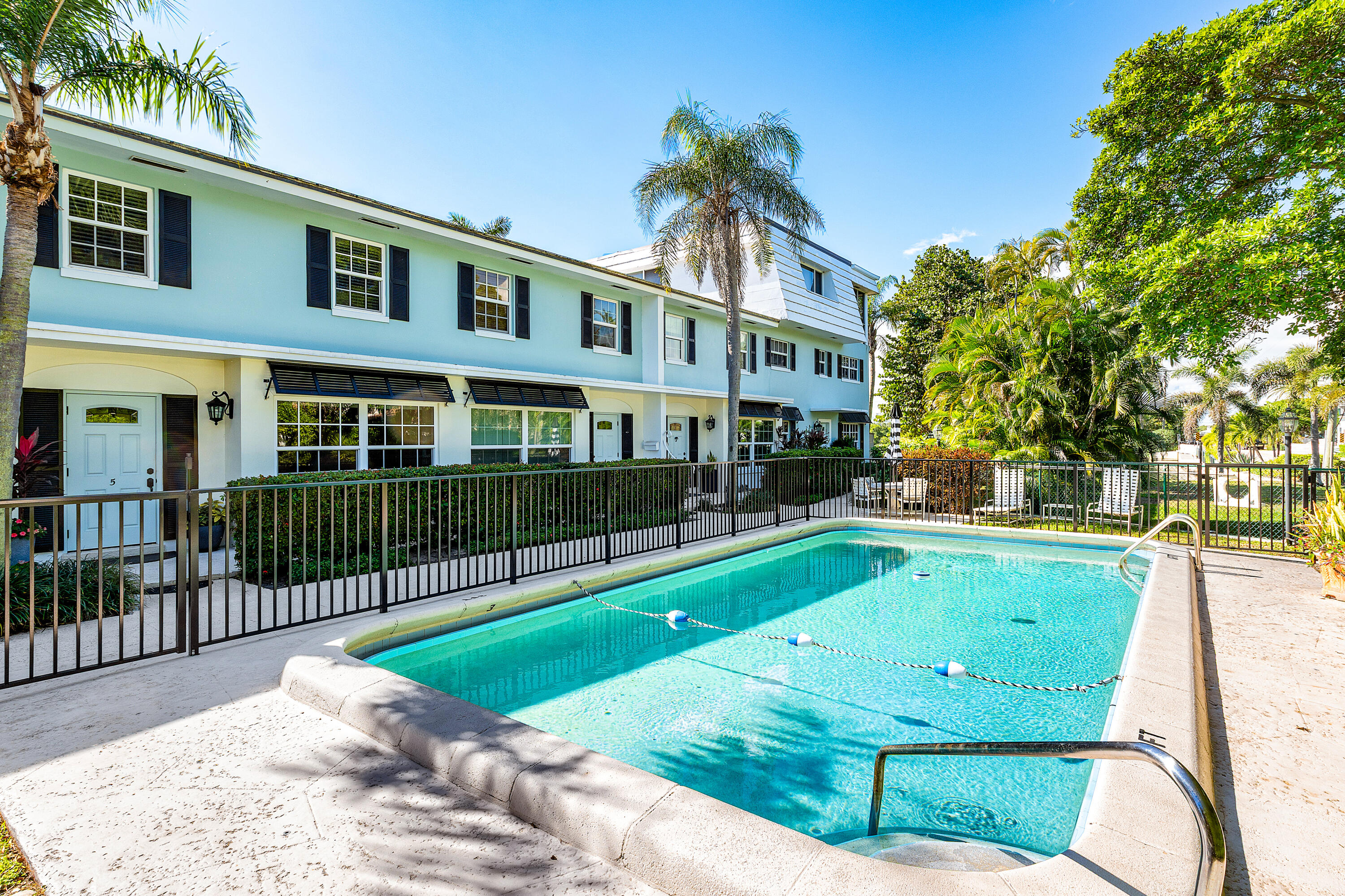6590 North Ocean Boulevard, Unit 5 Ocean Ridge, FL 33435 - Photo 14 of 20 a view of a house with a yard