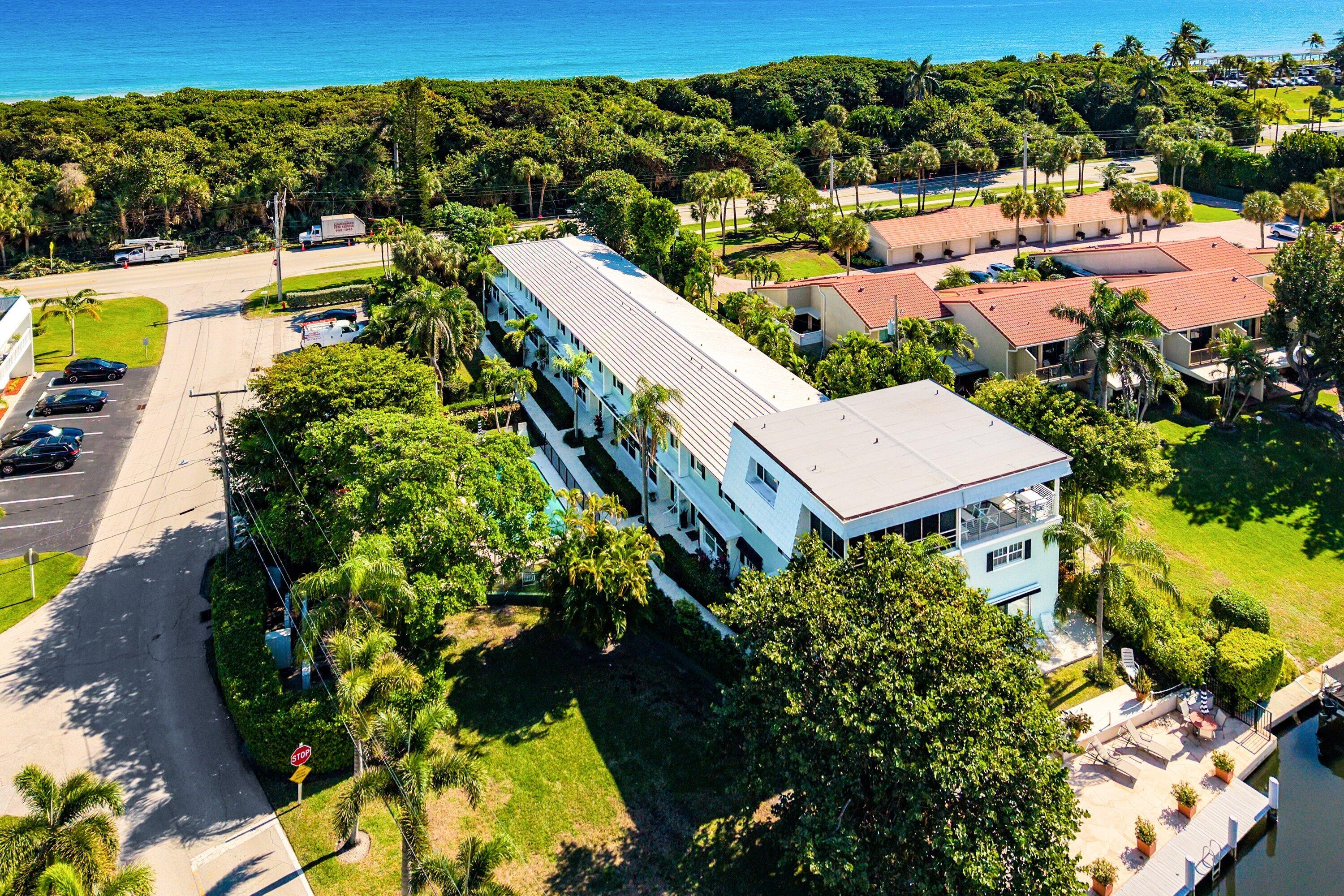 6590 North Ocean Boulevard, Unit 5 Ocean Ridge, FL 33435 - Photo 15 of 20 an aerial view of residential houses with outdoor space